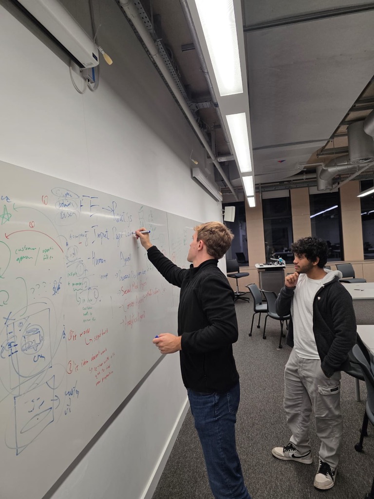 UCL Agentverse Hackathon - whiteboard brainstorming